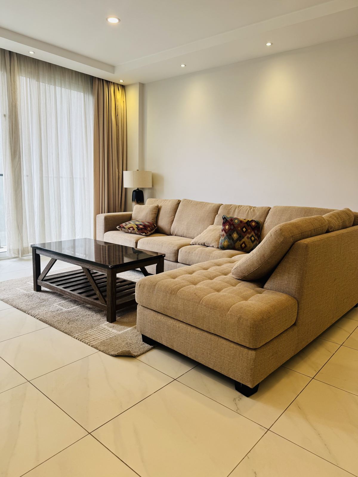 Furnished living room with sectional sofa